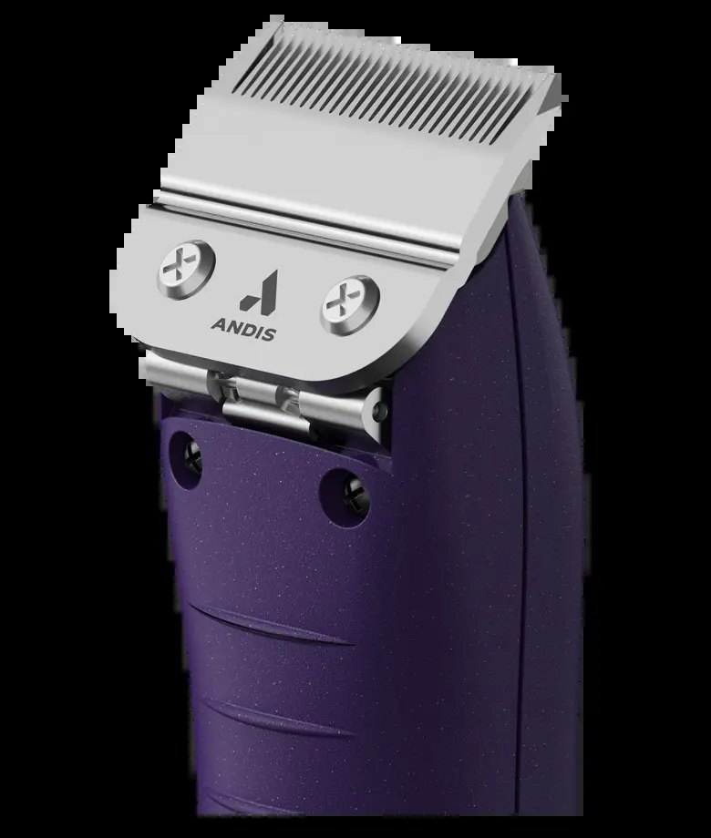 Close-up of Andis blade fitted on purple clipper head